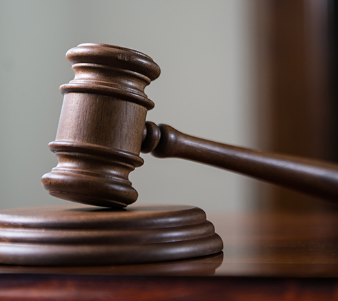 Closeup of gavel in court room