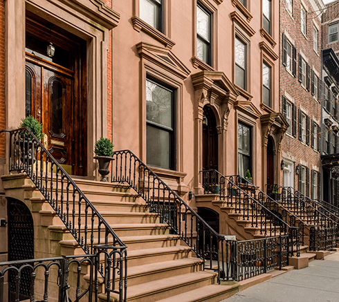 Brownstone facades & row houses in an iconic neighborhood of Br