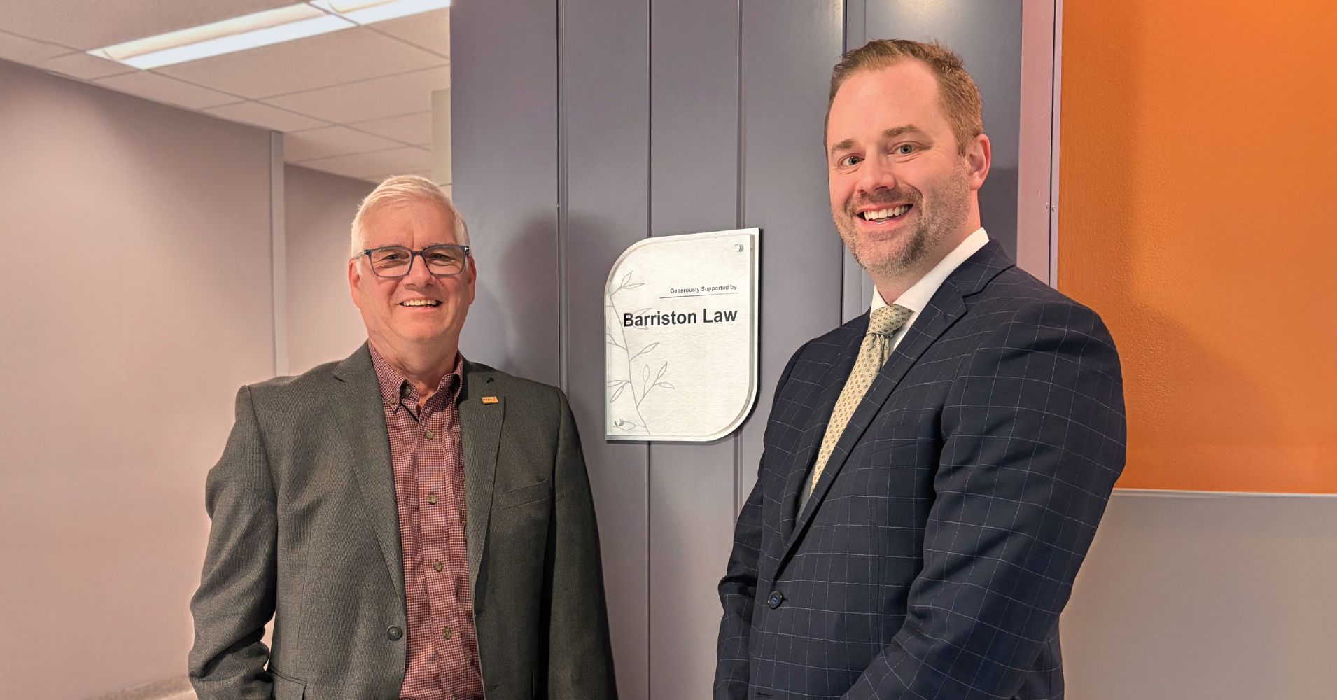 B Corp - Community Slide 10 - RVH Foundation Doug Moody and Josh Valler standing in front of the Barriston Law plaque at the Royal Victoria Regional Health Centre