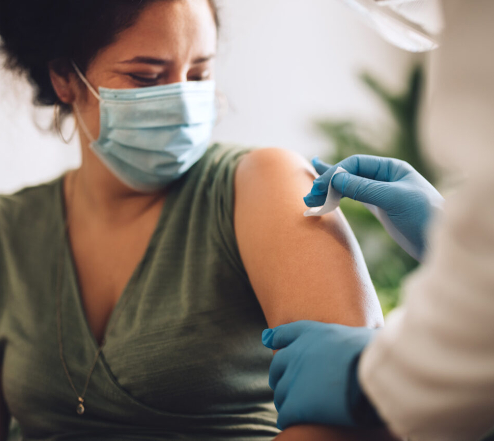 woman getting vaccination